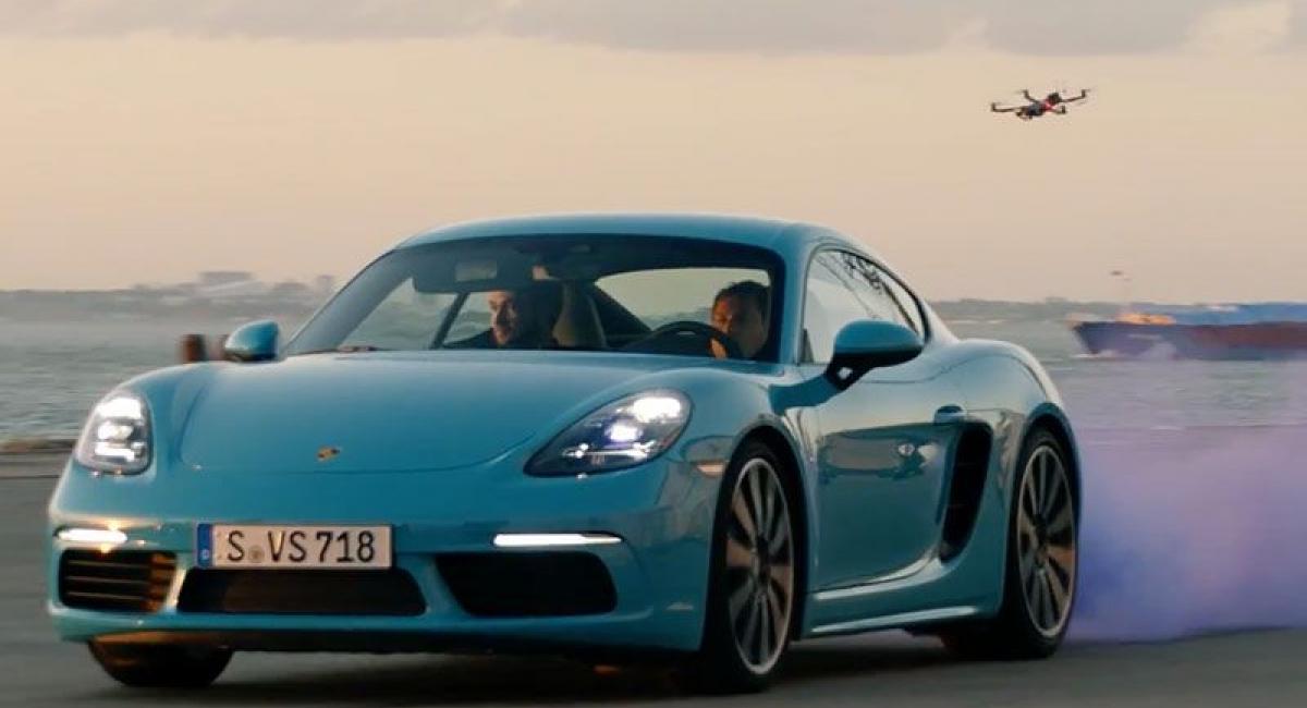 Porsche 718 Cayman S vs drones (vid)